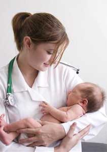 nurse holding a baby